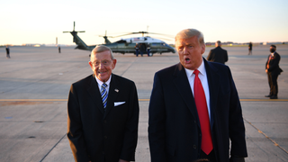 Lou Holtz, who likened football to storming Normandy, has COVID-19